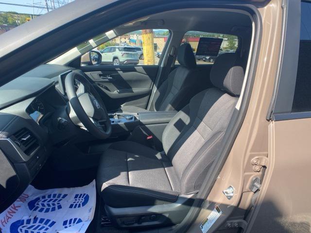 Photo of 2025 Baja Storm Metallic Nissan Rogue
