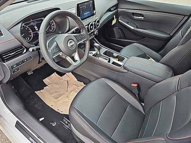 Photo of 2025 Aspen White Tricoat/Super Black Nissan Sentra