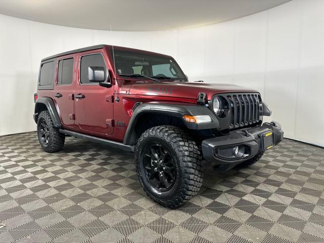 Photo of 2021 Snazzberry Pearlcoat Jeep Wrangler Unlimited
