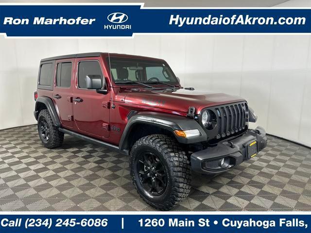 Photo of 2021 Snazzberry Pearlcoat Jeep Wrangler Unlimited