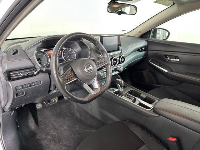 Photo of 2024 Aspen White Tricoat/Super Black Nissan Sentra