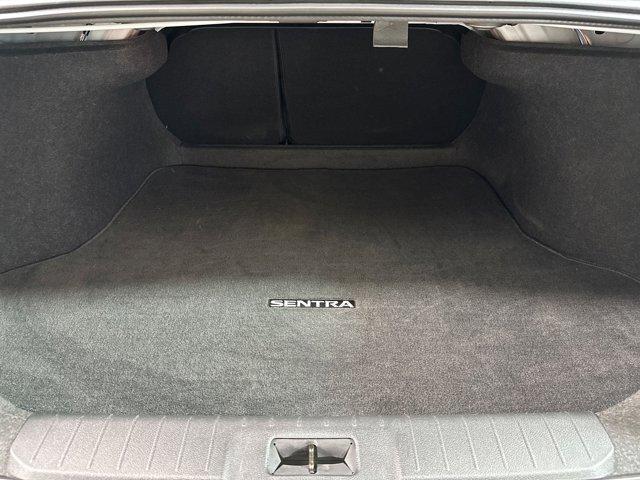 Photo of 2024 Aspen White Tricoat/Super Black Nissan Sentra