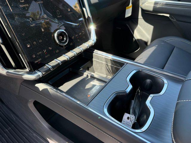 Photo of 2025 Volcanic Red Tintcoat GMC Acadia