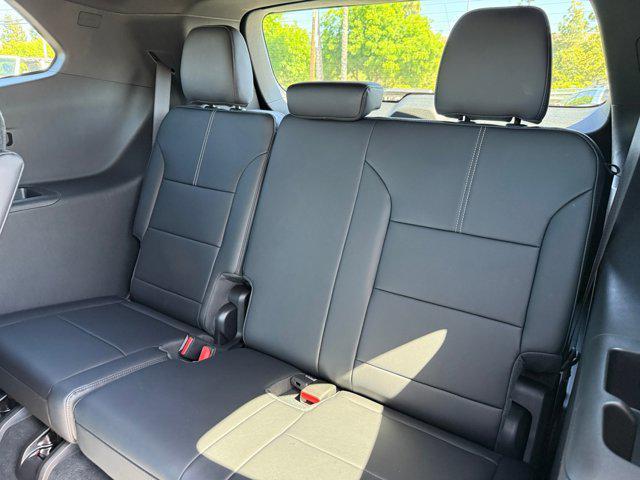 Photo of 2025 Volcanic Red Tintcoat GMC Acadia