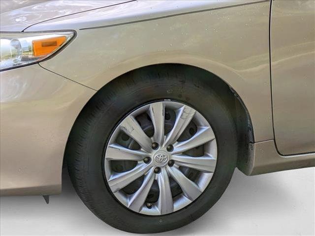 Photo of 2013 Sandy Beach Metallic Toyota Corolla