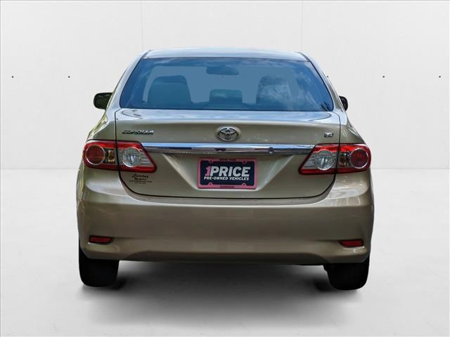 Photo of 2013 Sandy Beach Metallic Toyota Corolla