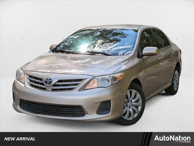 Photo of 2013 Sandy Beach Metallic Toyota Corolla