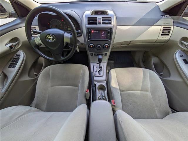 Photo of 2013 Sandy Beach Metallic Toyota Corolla