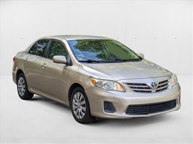 Photo of 2013 Sandy Beach Metallic Toyota Corolla