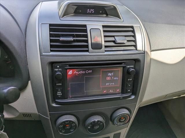 Photo of 2013 Sandy Beach Metallic Toyota Corolla