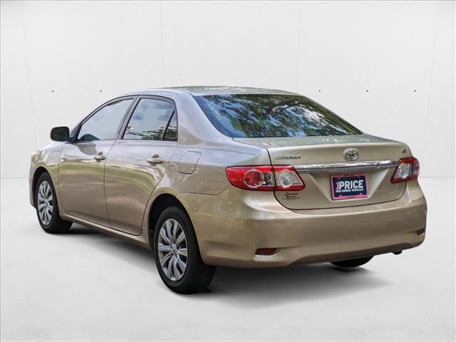 Photo of 2013 Sandy Beach Metallic Toyota Corolla