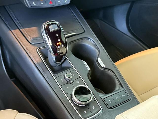 Photo of 2024 Crystal White Tricoat Cadillac XT4