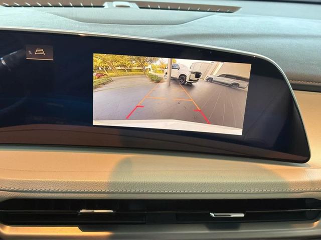 Photo of 2024 Crystal White Tricoat Cadillac XT4