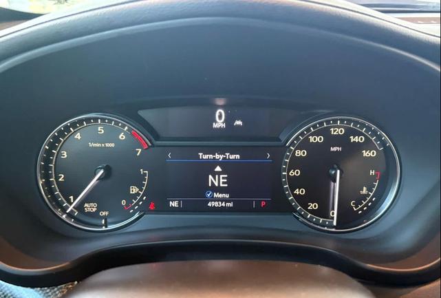 Photo of 2023 Stellar Black Metallic Cadillac XT4
