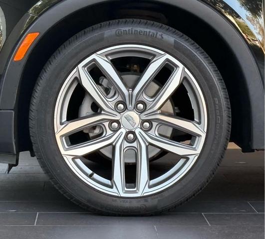 Photo of 2023 Stellar Black Metallic Cadillac XT4