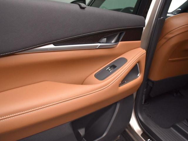 Photo of 2025 Warm Titanium/Black Obsidian INFINITI QX60