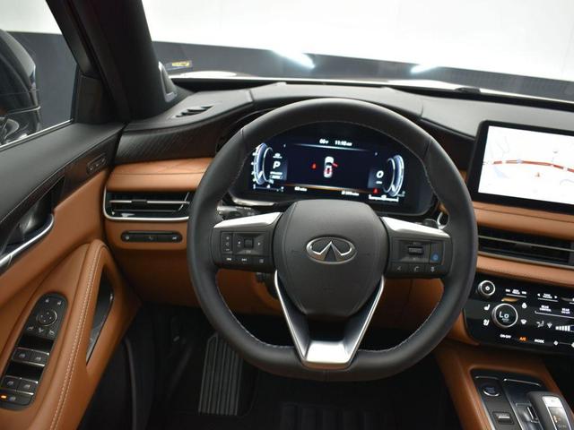 Photo of 2025 Warm Titanium/Black Obsidian INFINITI QX60