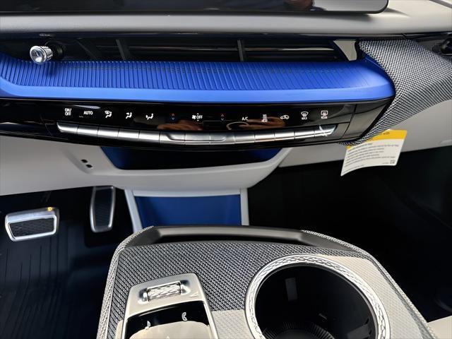 Photo of 2025 Radiant Red Tintcoat Cadillac OPTIQ