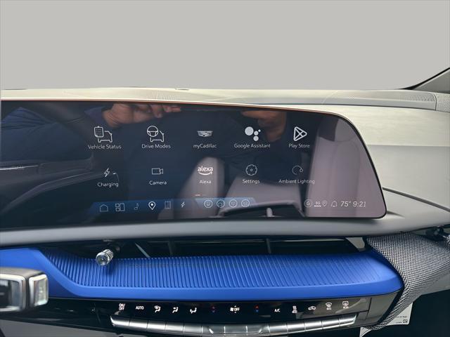 Photo of 2025 Radiant Red Tintcoat Cadillac OPTIQ