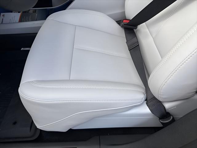 Photo of 2025 Radiant Red Tintcoat Cadillac OPTIQ