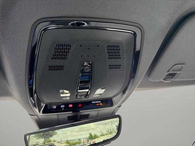 Photo of 2025 Radiant Red Tintcoat Cadillac OPTIQ