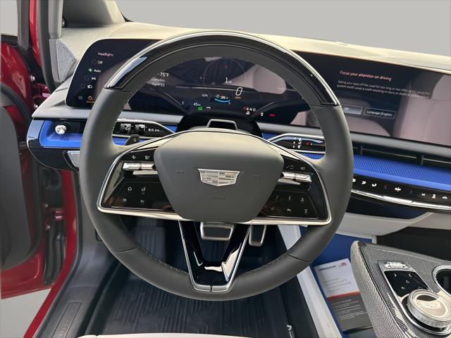 Photo of 2025 Radiant Red Tintcoat Cadillac OPTIQ
