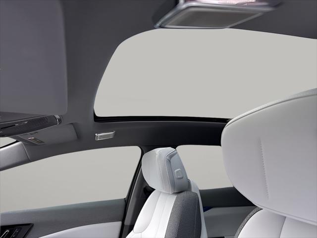 Photo of 2025 Radiant Red Tintcoat Cadillac OPTIQ