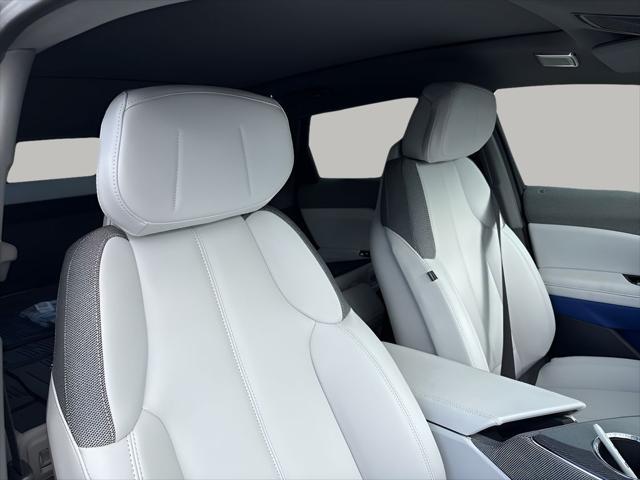 Photo of 2025 Radiant Red Tintcoat Cadillac OPTIQ