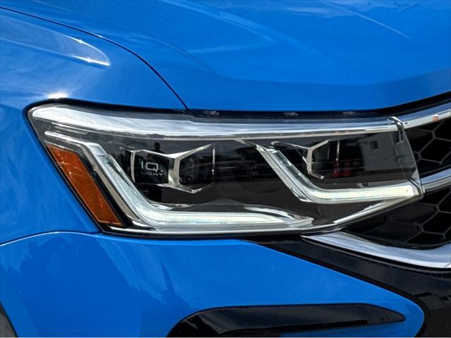 Photo of 2024 Blue Volkswagen Taos