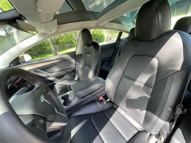Photo of 2022 Black Tesla Model 3