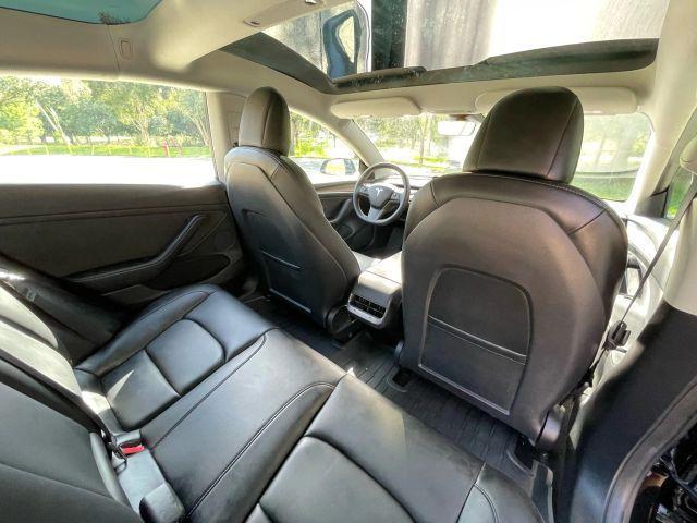 Photo of 2022 Black Tesla Model 3