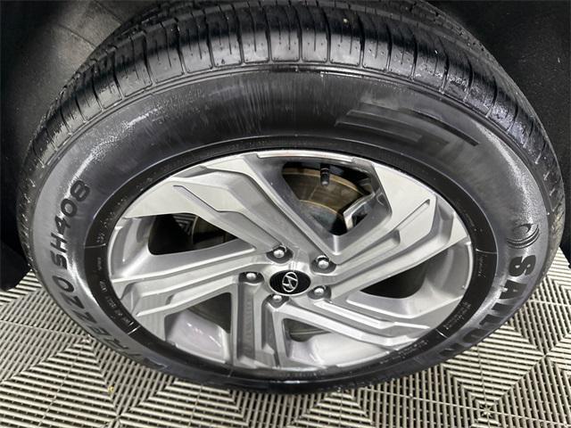 Photo of 2023 Serenity White Pearl Hyundai SANTA FE