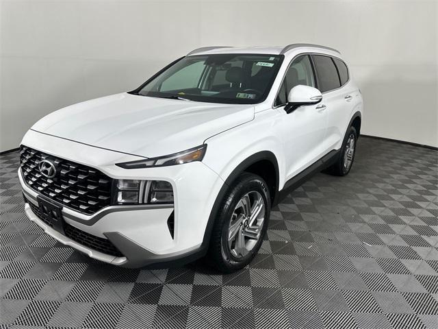Photo of 2023 Serenity White Pearl Hyundai SANTA FE
