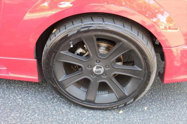 Photo of 2007 Torch Red Ford Mustang