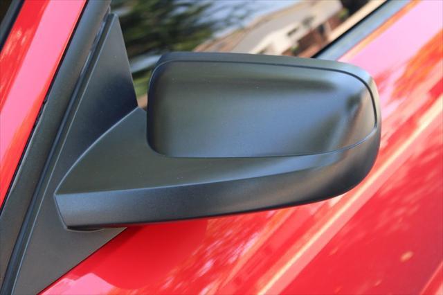 Photo of 2007 Torch Red Ford Mustang
