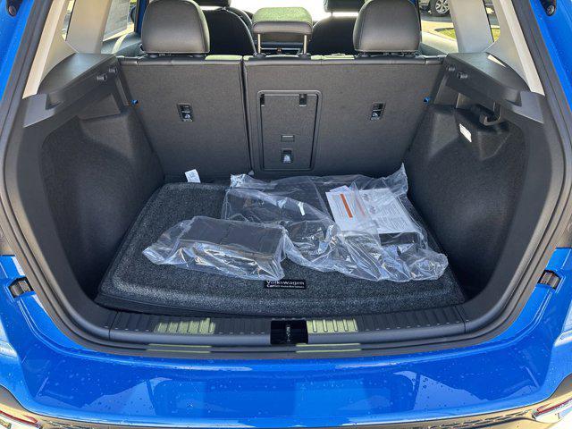 Photo of 2025 Cornflower Blue Volkswagen Taos