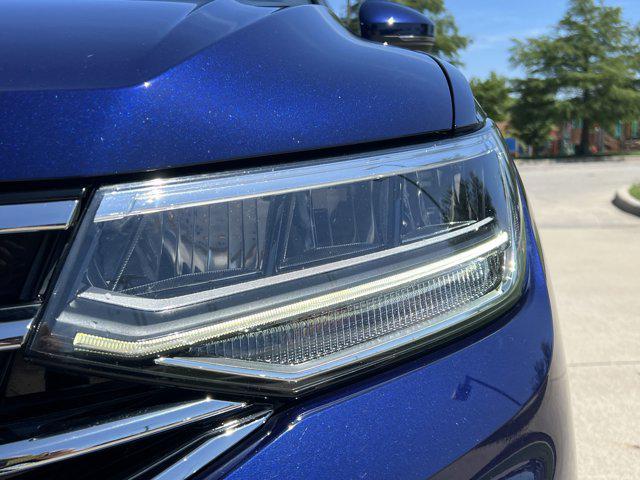 Photo of 2022 Atlantic Blue Metallic Volkswagen Tiguan