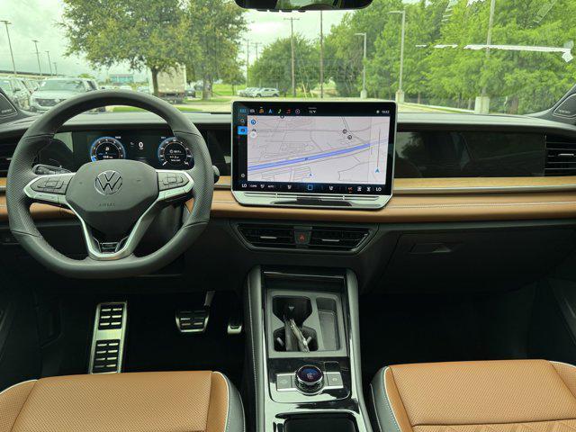 Photo of 2025 Avocado Green w/Deep Black Roof Volkswagen Tiguan