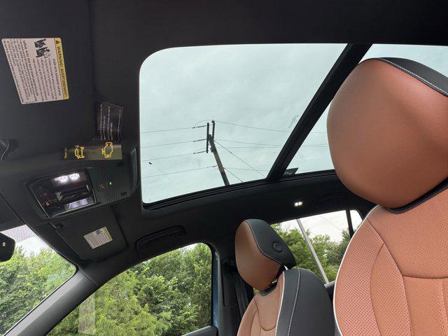 Photo of 2025 Avocado Green w/Deep Black Roof Volkswagen Tiguan