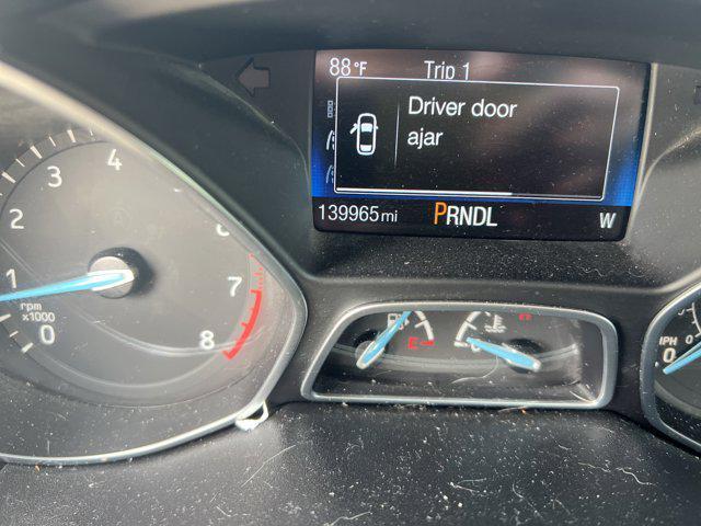 Photo of 2015 Ingot Silver Ford Focus