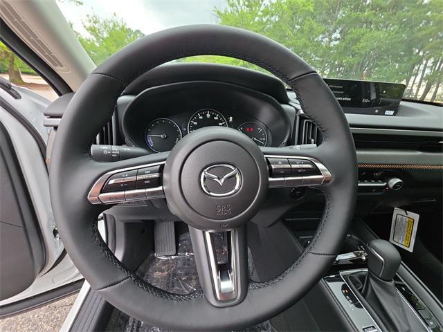 Photo of 2025 wind chill pearl Mazda CX-50 Hybrid
