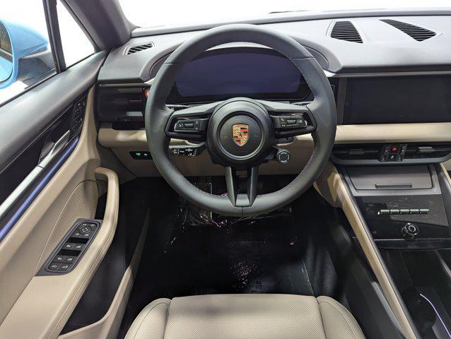 Photo of 2025 Frozen Blue Metallic Porsche Macan