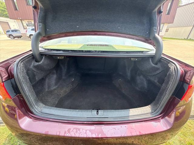 Photo of 2010 MAROON Acura TSX