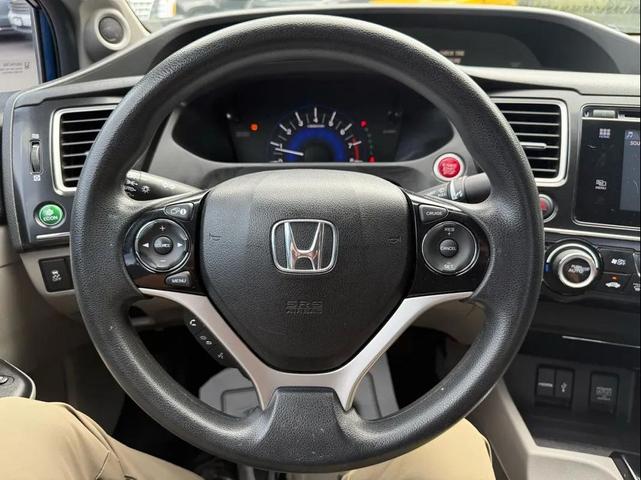 Photo of 2014 Dyno Blue Pearl Honda Civic