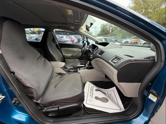 Photo of 2014 Dyno Blue Pearl Honda Civic