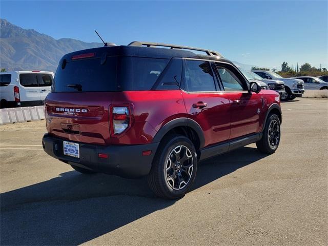 Photo of 2025 Ruby Red Metallic Tinted Clearcoat Ford Bronco Sport