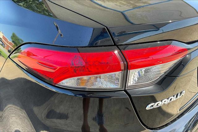 Photo of 2024 Midnight Black Metallic Toyota Corolla