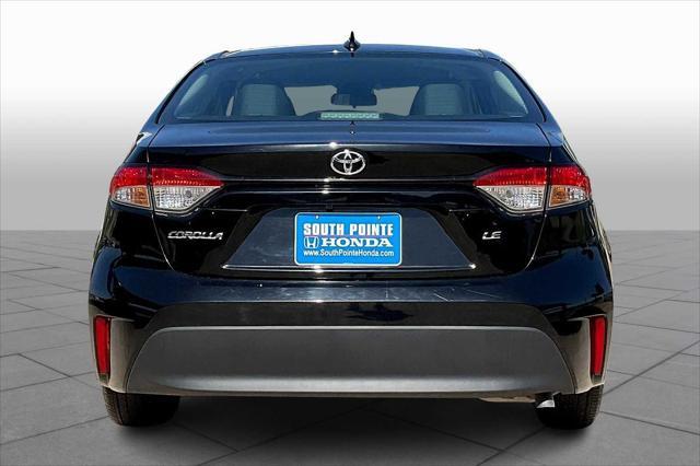 Photo of 2024 Midnight Black Metallic Toyota Corolla