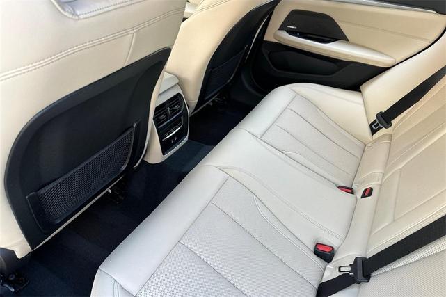 Photo of 2023 Black Sapphire Metallic BMW i4 Gran Coupe