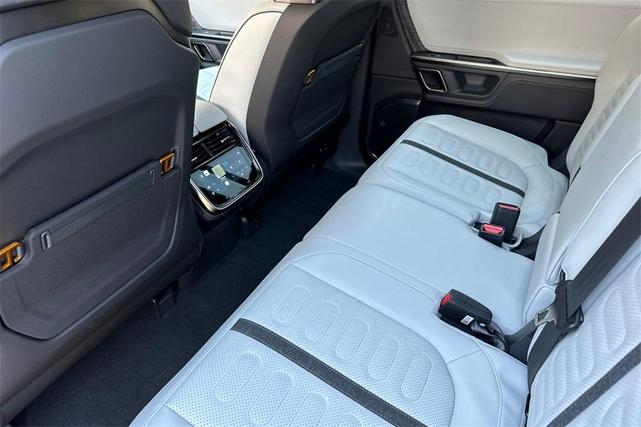 Photo of 2023 Compass Yellow Rivian R1S